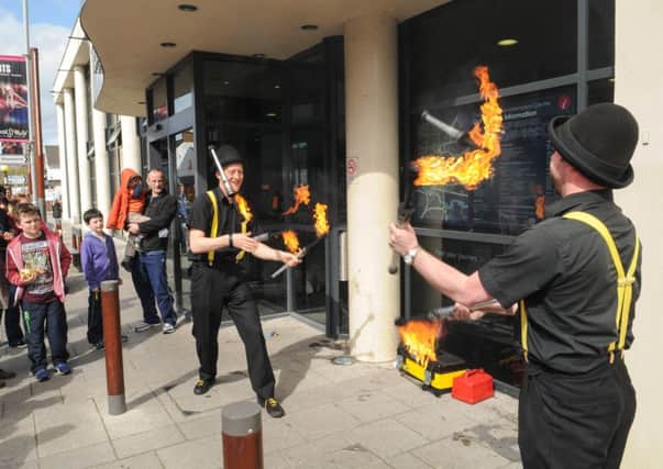 Playing with fire at the  Cookstown Council Easter Fun Day held at the Burnavon Arts and Cultural Centre.INMM1614-388