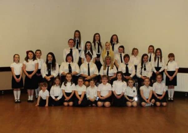 The Leaders and Girls of St Patricks Parish Church are pictured following their very successful display. All the girls worked very hard over the 
past couple of months to perfect their sketches of the Easter Story, singing and marching  INBT-15F-GFS DISPLAY 2014.