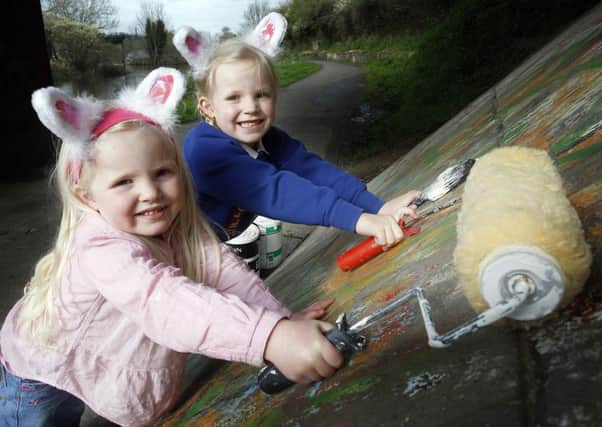 Painting the town red, and every other colour of the rainbow, are two of the youngest 'Easter Bunnies' from the congregation taking part in Lisburn Cathedral's Big Church Serve, Lucy (aged 3) and Lauren (aged 4) Harper from Lisburn. It is hoped that this unique event will bring colour and love to Lisburn City Centre and Hill Hall Estate this Easter.

Pictures By: Aidan O'Reilly