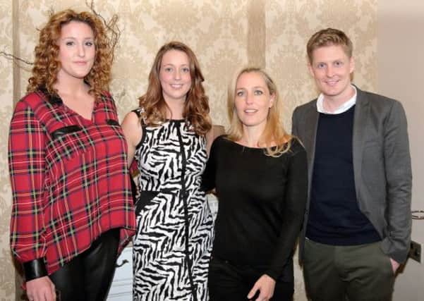 Deborah McCarthy (second from left) at the opening of her new hairdressing saloon in Lisburn with cast members from The Fall including Bronagh Waugh, X-Files actress Gillian Anderson and Gerald McCarthy. US1416-535cd Picture: Cliff Donaldson