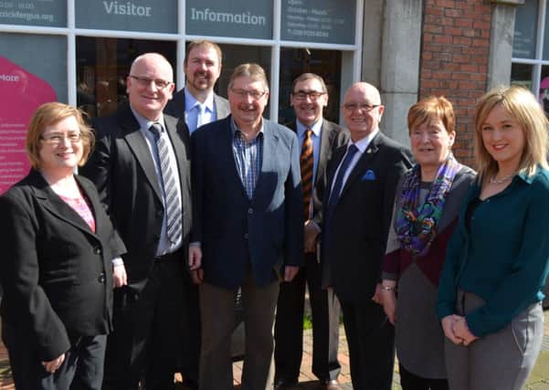 East Antrim MP Sammy Wilson with the seven Carrickfergus DUP candidates for next month's local government election. INCT 17-702-CON