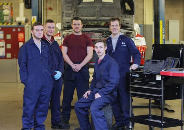 Belfast Met Mechanics Ramp up their Skills for Circuit of Ireland
Belfast Metropolitan College and Circuit of Ireland organisers have joined forces in a new for 2014 partnership which offers the College's motor vehicle students the opportunity to be Associate Scrutineers and Assistant Mechanics at this years Circuit of Ireland Rally, 17-19 April. 
Pictured (L-R) are Belfast Met students and Circuit of Ireland Rally Assistant Scrutineers  Declan Larkin Fearghal McLarnon, Liam McQuoid, Pearse Trueman and Ciaran Marron.