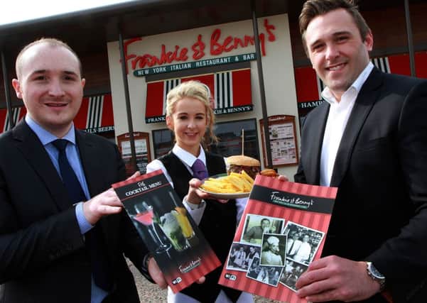 Arron Griffth, Deputy manager, waitress Amy O'Hara and Alastair Coulson, Director of Asset Management for The Lotus Group.