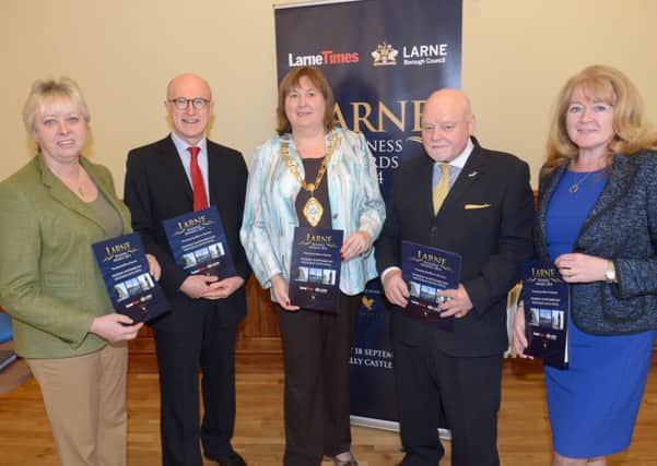 Pictured in the Larne Town Hall for the launch of the the Larne Times/Larne Borough Council Larne Business Awards 2014 are (from left): Larne Borough Council Director of Development Linda McCullough,UTV's Jamie Delargy, Larne Mayor Maureen Morrow,  Deputy Regional Advertising Manager Roy Sharpe and LBC Chief Executive Geraldine McGahey. INLT 15-467-PR