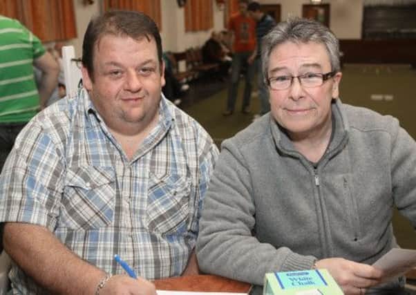 Paul Reid and Steve Law keeping track of the scores at the Ballinderry pairs championship at Hilden Bowling Club. US5112-534cd Picture: Cliff Donaldson