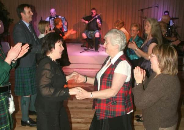 At last I got ther chance to wear the trousers in a room full of women. Displaying the very best of Ceilidh  and Set dancing at Harvey's Point Hotel. (290108 MVB 19 Burns)