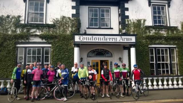 Former Giro d'Italia winner Stephen Roche meets twenty cyclists who took part on a 'Ride the Route' event from Bushmills to Carnlough.