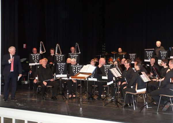 Members of Ballymena Young Conquerors pictured on stage during their annual concert in the Braid along with compere Jackie Fullerton. INBT17-204AC