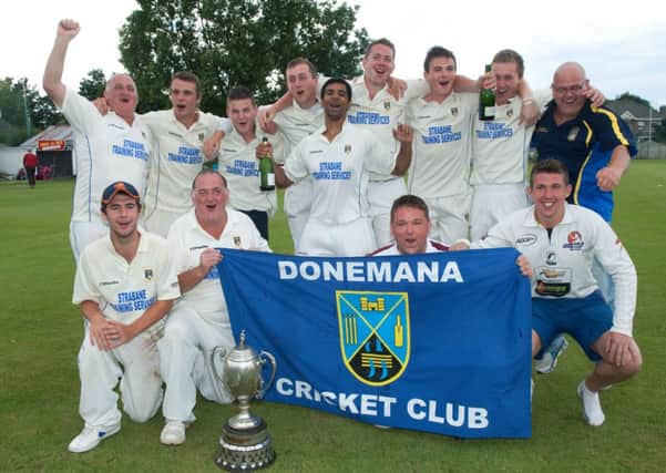 The Donemana players celebrate after their Danske Bank North West Senior Cup victory last season. INLS3113-137KM