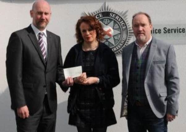Detective Chief Inspector Mark McClarence is pictured presenting a cheque for £5,480 to Rosemary Morton and Raymond Craig of North West Counselling to aid their work with those who use illegal drugs.  The money was part of the proceeds of the sale of a car that police seized as part of an anti-drugs operation.