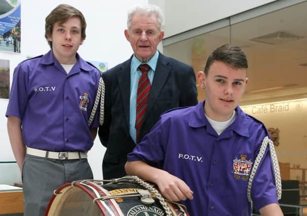 Cllr Maurice Mills with Jamie Buick and Kyle Johnston of Teenies promoting the forthcoming pageant in Broughshane.