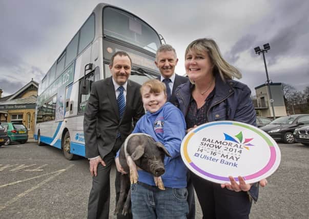 Pictured launching the travelplan are: back l-r Jim McCauley, Translink Service Delivery Manager, Gerard McAtarsney, Translink NI Railways Route Manager with front l-r Samara Radcliffe who will be exhibiting at the show with Chloe the British Saddleback piglet and RUAS Operations Director Rhonda Geary. 
 Picture by Brian Morrison.
