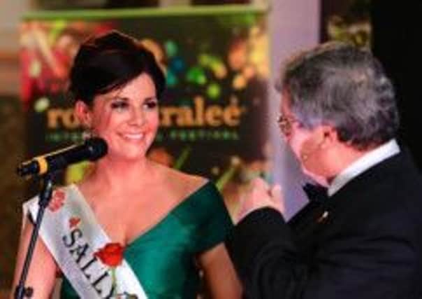 Sinead Taggart chats to MC Jimmy Cowan on stage at the Tyrone Rose Selection night in Greenvale Hotel