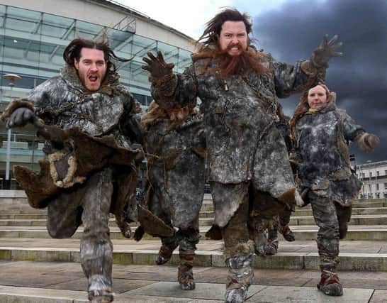 A group of Wildlings, characters from from Game of Thrones, raced to the Waterfront Belfast recently as the Northern Ireland Tourist Board (NITB), in partnership with Northern Ireland Screen and Belfast City Council, announced that free tickets to the highly anticipated HBOAE Game of ThronesAE Exhibition, which returns to Northern Ireland from June 11  15, 2014 go on release on May 8.  The exhibition will take place at Waterfront Belfast and tickets are available from either Belfast Waterfront website www.waterfront.co.uk or by calling the Waterfront Box Office (028) 9033 4455.  Exhibition opening hours will be 10am-9pm daily and customers will be required to reserve a time slot for their entry to the exhibition.   Tickets, which are free of charge, will be limited to a maximum of 4 per person/booking.  Please Note: tickets will NOT be available from the Waterfront or Ulster Hall box office counters.