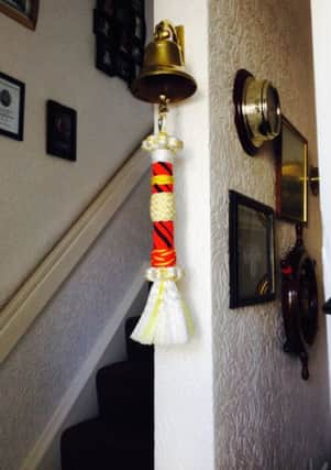 Malcolm's own bell rope at home with the colours of the Merchant Navy colours: green for starboard and red for port.
