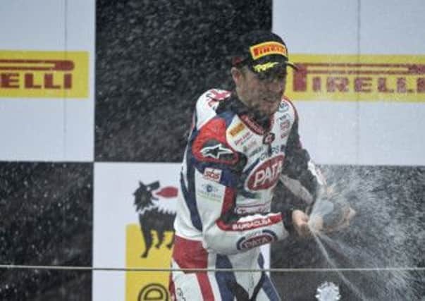 Jonathan Rea celebrates his race win at Assen
