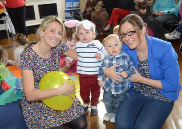 Eva and Ronan with mums Clare and Roisin at the Little Angels Easter party. INLT 16-306-PR