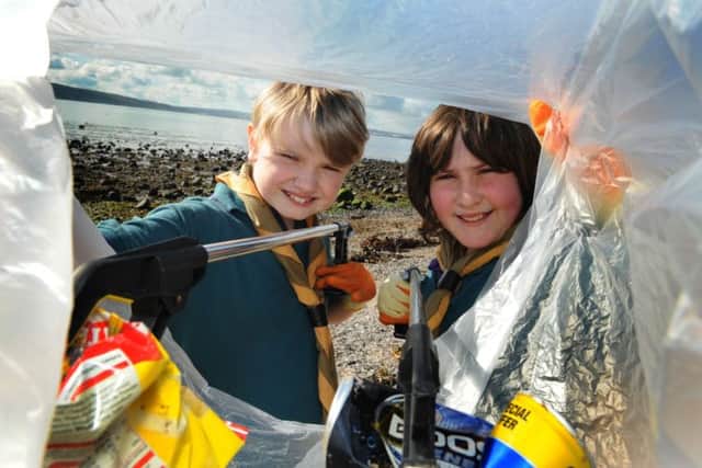 Colin Brown and Troy Tufts helped out at the M&S Big Beach Clean-up at Loughshore Park, Jordanstown. Pic by Simon Graham/Harrison Photography.