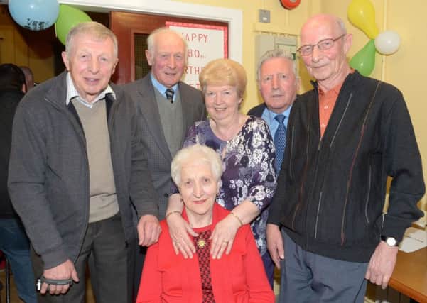 An 80th birthday party for Betty Dougal was held in Kilwaughter Village Hal to raise money for CRY (Cardiac Risk in the Young). With Betty are Mervyn, Houston, Elgy and Ivan Crooks and sister Yvonne Crooks. INLT 18-355-PR