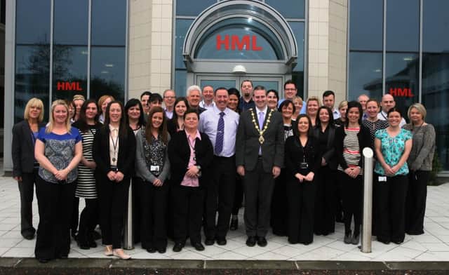 The Mayor Martin Reilly pictured on a visit to HML, Springtown on Monday morning as part of the company's 10thanniversary celebrations. He is pictured with Billy Hutchinson, Managing Director and staff who have been with the firm since it opened in the city. DER1814MC001