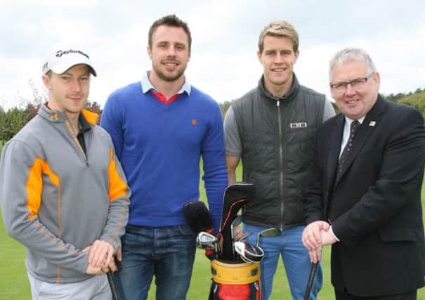 Michael Heaney, Tommy Bowe, Andrew Trimble and Tom Mallon from the MS Society.