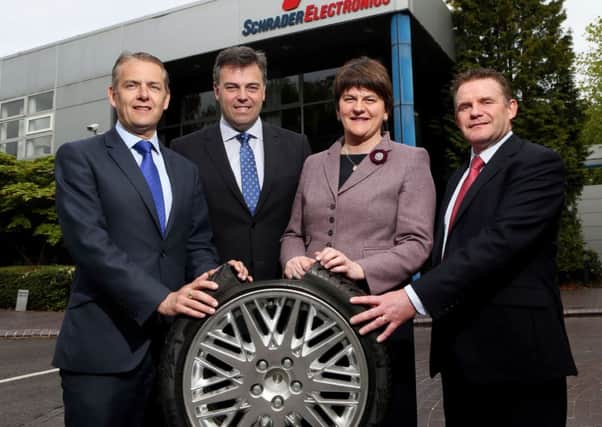 Announcing that Schrader Electronics Ltd is investing over £56 million and creating 241 new jobs at its Carrickfergus and Antrim facilities, are (left to right): Stephen McClelland,  managing director Schrader Electronics, Alastair Hamilton, chief executive Invest NI, Enterprise Minister Arlene Foster and Graeme Thompson, Schrader (photo William Cherry/Presseye).
 INCT 18-759-CON