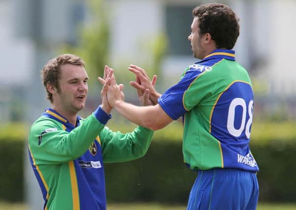 North West Warriors 
Andrew McBrine and Stuart Thompson celebrate after taking a wicket. 
Mandatory Credit ©INPHO/Lorraine O'Sullivan