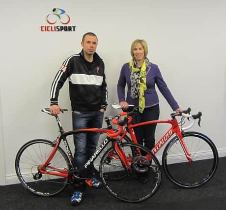 Jonathan Smyth, Cicli Sports, pictured alongside Sandra Overend MLA.