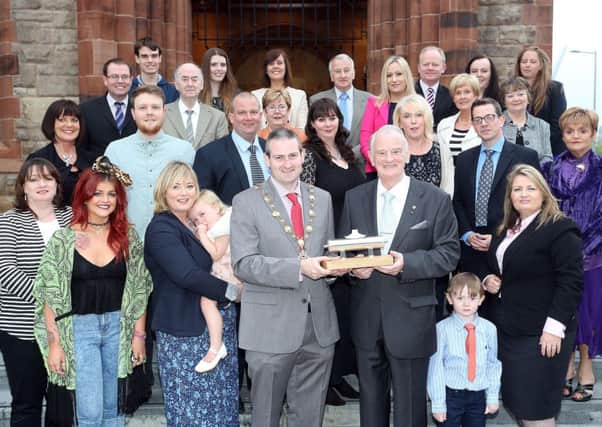 Dr Tom McGinley and his family and friends pictured at the Guildhall where he was given the Freedom of the City this week