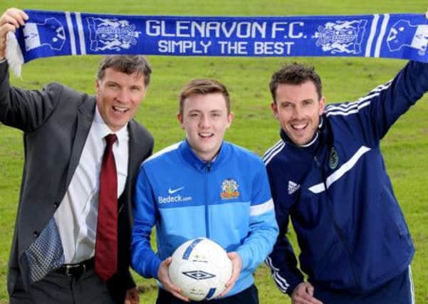 Laurelhill Community College principal James Martin and PE teacher Mark Watson show their support for pupil James Singleton before Saturday's Irish Cup final US1418-607cd Picture: Cliff Donaldson