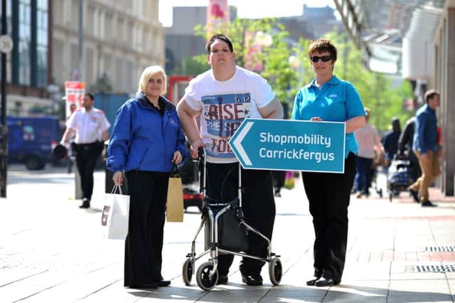 At the launch of a new Sighted Guide shopping service for blind and partially sighted people are (right - left) Olive Rodgers, RNIB NI, Ryan McCartney and Mandy Magee, Shopmobility Sighted Guide (picture: Michael Cooper). INCT 19-702-CON