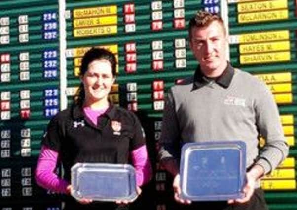 Lisburn golfer Paula Grant at St Andrews with the gent's winner from the Scholars Tournament.