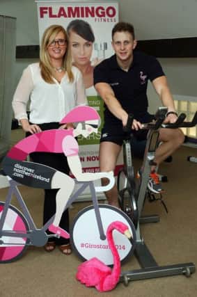 Grace Gillen (Ballymena Town Centre Development) is pictured with Andrew Barr of Flamingo promoting their forthcoming spin for the Giro. INBT19-205AC