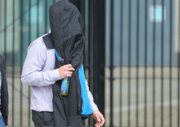 PACEMAKER BELFAST    29/04/2014
A defendant  leaves court as  the Murder  trial for  Kevin McDaid in Coleraine  was adjourned Photo Colm Lenaghan/Pacemaker Press