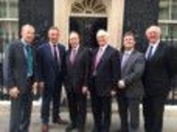 North Belfast MP Nigel Dodds (third from left) and South Antrim MP William McCrea (third from right) were among a DUP delegation that met with the Prime Minister last week. INNT 19-520CON