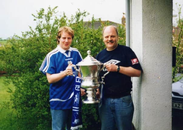 Yer Man and Yer Man's Da with the Irish Cup in 1997. And considerably more hair.