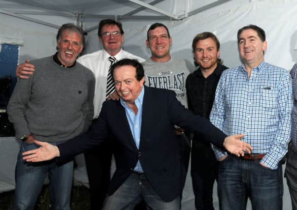 The Star-studded line up at the Question of Sport night which opened the Wan Big Weekend A Fundraiser for Moortown GAC. Pictured are Mark Lawrenson, Willie Anderson, Marty Morrissey, Martin Rogan, Owen Mulligan, John Joe O'Neill and Frank McGuigan.INMM1914-376