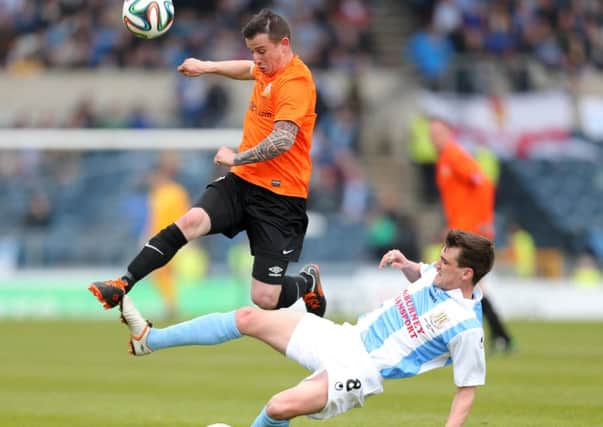 Ballymena's Gavin Taggart with Glenavon's Shane McCabe in action during today's Irish Cup final. Picture: Press Eye.
