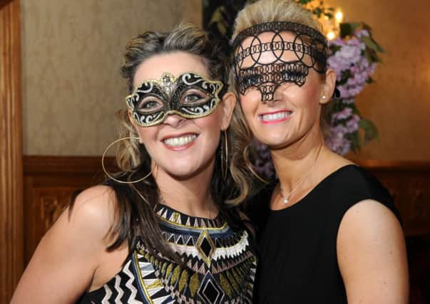 Captured at the Masquarade May Ball held in the Glenavon House Hotel on Saturday night were Diane Gillespie and Andrea Linton.INMM1914-417