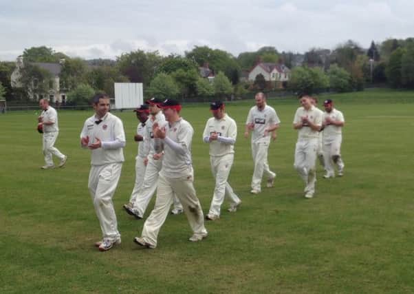 Templepatrick Cricket Club's 1st XI walk off the drinks interval during their clash with Holywood on Saturday afternoon. Photo: John Gillespie