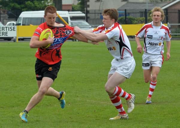The Warriors and the Ulster Exiles in action during the Carrick Sevens tournament. INCT 19-006-PSB