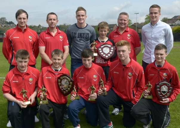 Banbridge Town Mid Ulster U15's trophy winners Josh Dennison  (Player of the Year),  Jordan Walker (Players Player of the Year), Liam Farrell and Jake Dennison (Leading Goalscorers), Michael Rafferty (Most Improved) and Liam Farrell  (Clubman of the Year) pictured with Managers Wylie Dickson,Simon Roberts and Leslie Dennison and Guests Aaron and Andrew Burns who presented the awards © Edward Byrne Photography INBL18-240EB