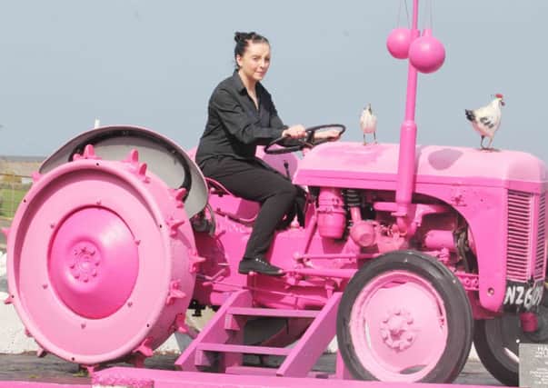 Leona McHenry gets to grip with a pink tractor in Ballintoy.PICTURE MARK JAMIESON.