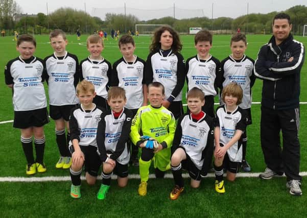 Rathfriland U11 Colts team are pictured with their kit sponsor Brian Travers of Travers Steel after their win over Portadown U11s at Annagh Utd on Saturday morning.