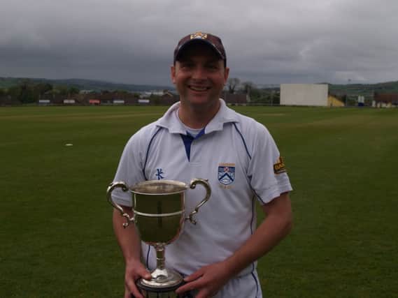 Coleraine captain Gordon Cooke with the trophy.
