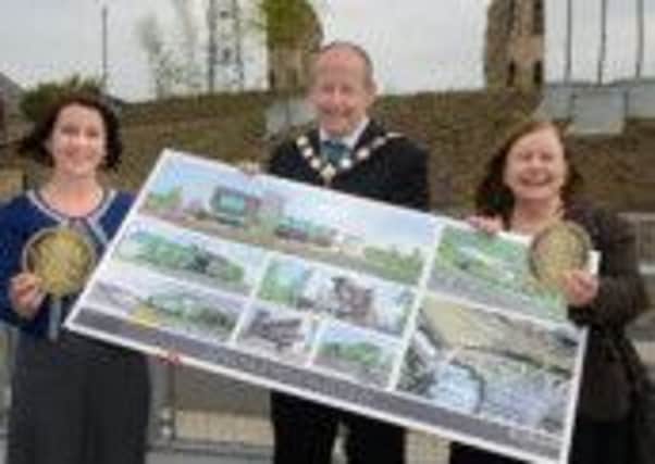 Pictured at the announcement of £7 million worth of European Union funding for the EARLS Project, a major peace and reconciliation initiative in Dungannon, are (Left-Right) Lorraine McCourt, SEUPB Director; Cllr Sean McGuigan, Mayor of Dungannon & South Tyrone Borough Council; and Bernadette McAliskey Co-ordinator of STEP community organisation. The EARLS Project aims to boost community interactions in Dungannon with the construction of a new 30,000 sq. ft. community building and the redevelopment of an interface area into a shared events and leisure space.