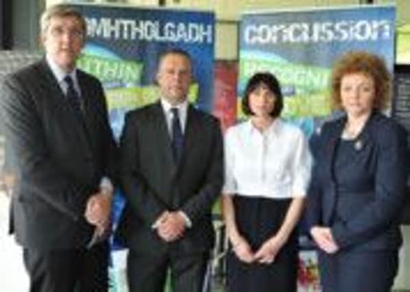 Pictured (left-right) are Education Minister John O'Dowd, Peter Robinson and Karen Walton, parents of Benjamin Robinson and Sports Minister Carál Ní Chuilín (picture: Michael Cooper). INCT 19-709-CON