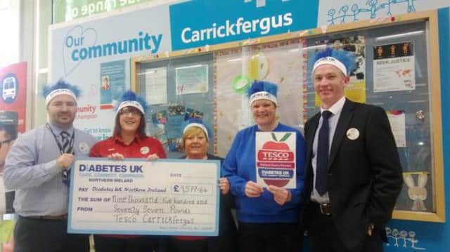 Colleagues from Tesco Carrickfergus celebrate raising £9,577.64 for Diabetes UK. Second from right is Anne Ritchie, Store Community Champion. INCT 19-701-CON