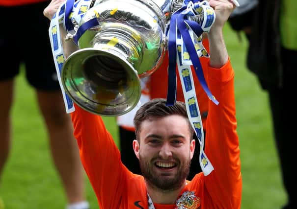 03rd May 2014  Photo by William Cherry/Presseye

Glenavon's goal hero Mark Patton with the Irish Cup after defeating Ballymena in Saturdays final at Windsor Park.