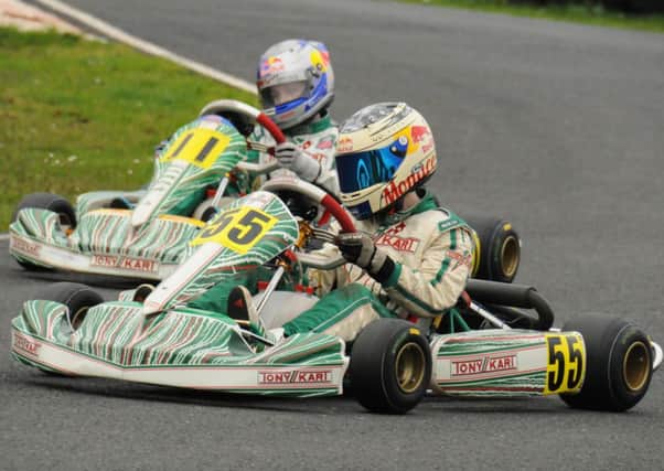 Sam McDonnell and Glenavy's Jack McGaughey battling it out in the Mini Max class.